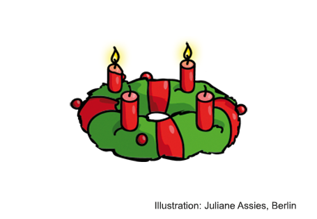 Auf einem Adventskranz brennen zwei Kerzen.